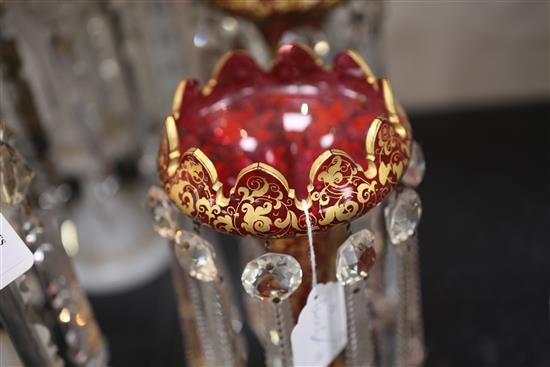 A pair of Bohemian gilt-decorated ruby glass table lustres, late 19th century, 27cm, one with damage